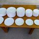 Service of 84 vintage white porcelain plates.