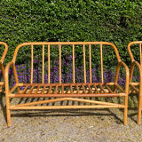 Vintage living room sofa and 2 rattan armchairs.