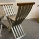 Pair of curule chairs designed by John Vesey, 1958, USA, brushed aluminum, walnut and leather