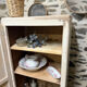 Small one-door Art Deco cabinet with a patina.