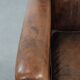 Beautiful vintage sheep leather armchair with a characterful appearance