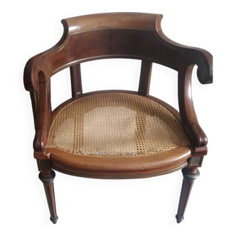 Armchair with canework and bronze detail