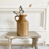 Set of three glazed ceramic pitchers