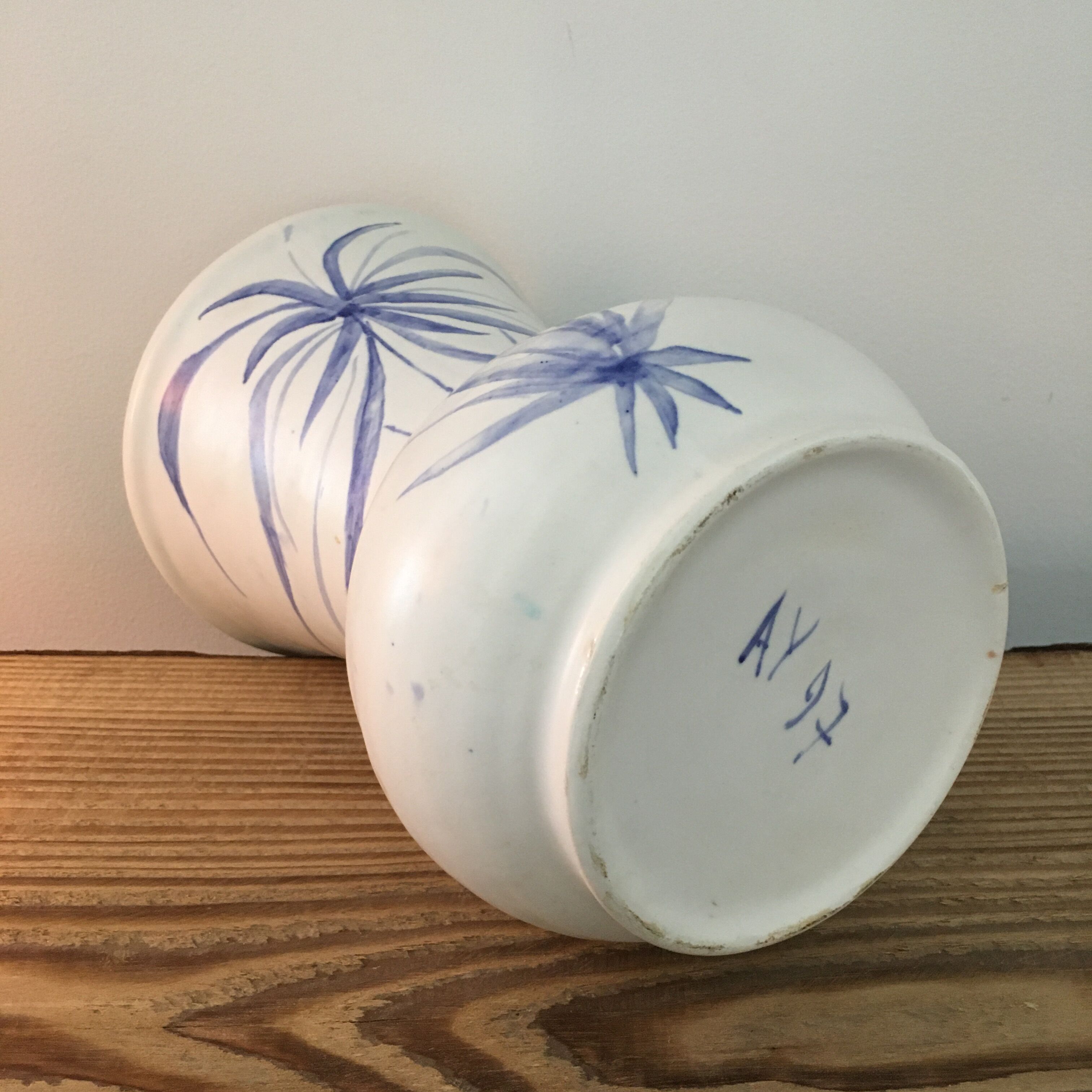 Ivory vase with blue decoration signed