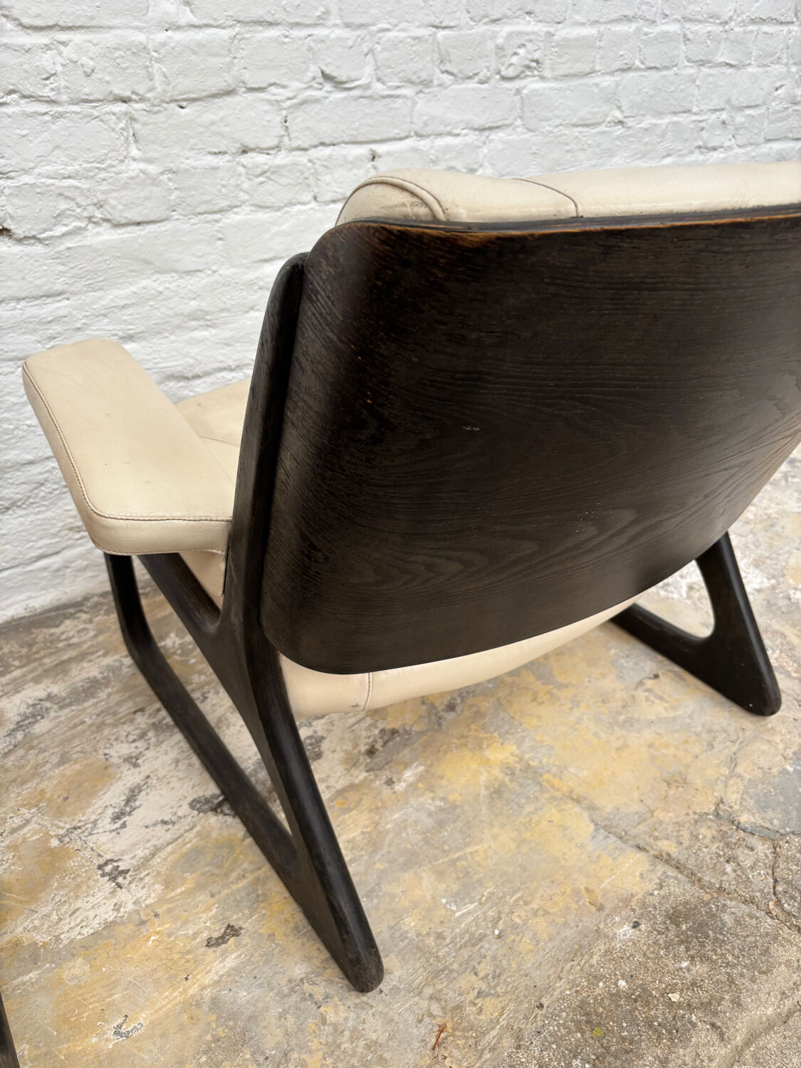 Set of two Baumann sled lounge chairs.