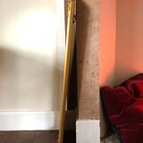 Old slim golden mirror