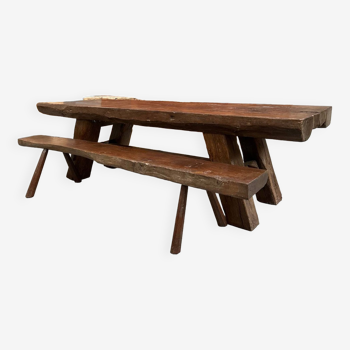 Handcrafted table in solid oak and its two benches