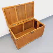 Vintage trunk in wood, rattan, caning, and brass.