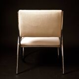 Chrome metal and white sky designer armchair