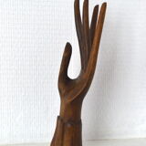 Carved wooden baguier hand