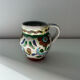 Small floral jug signed