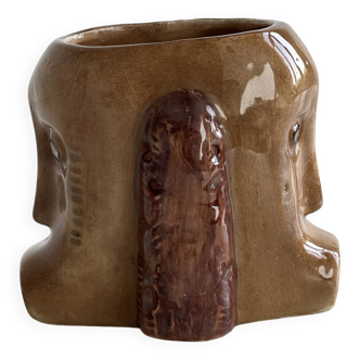 Faces ceramic mug.