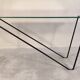 Superb asymmetrical coffee table AIRBORNE 1950s glass and lacquered metal.