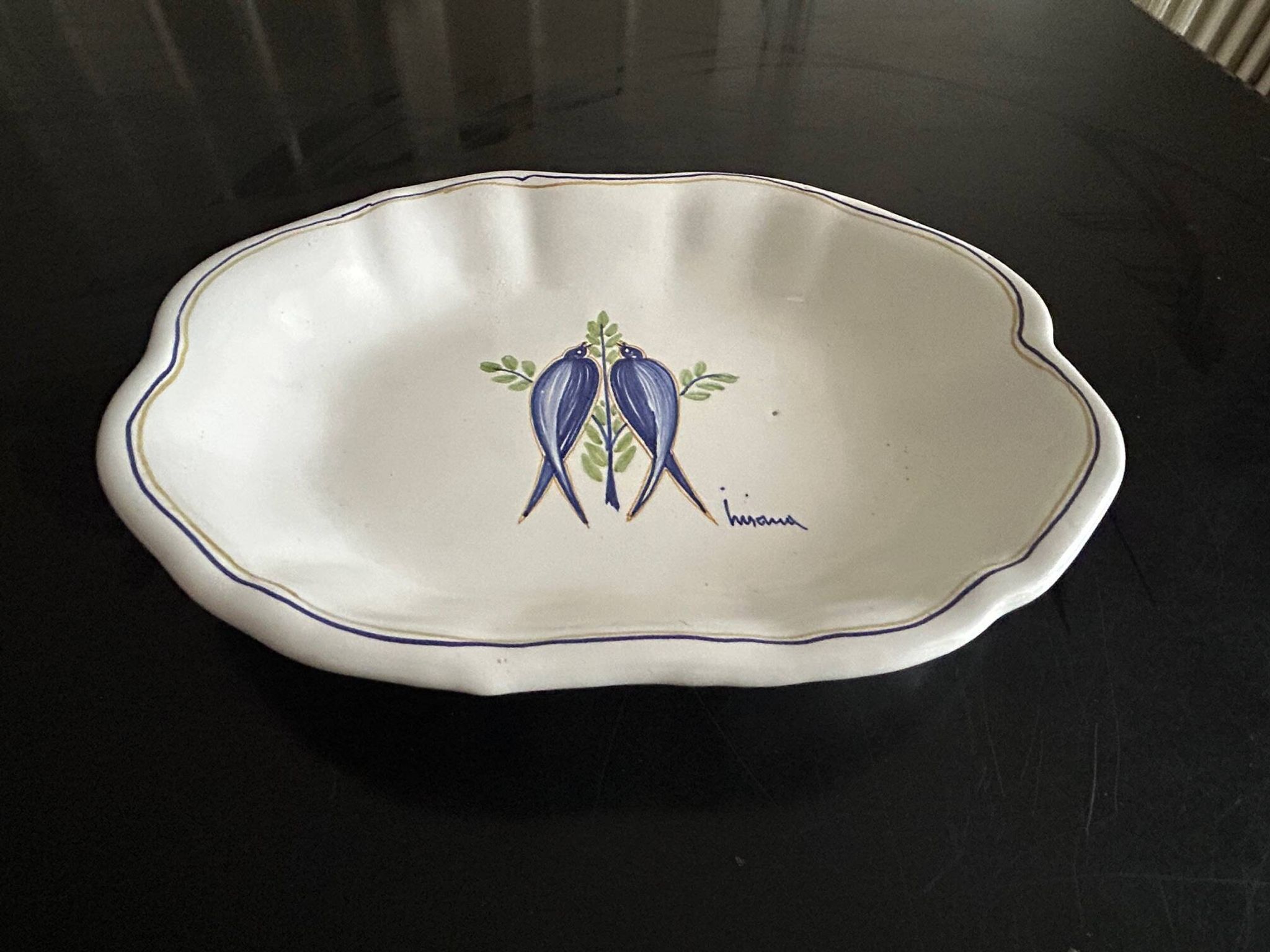 vintage plate in earthenware with birds