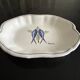 vintage plate in earthenware with birds