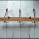 Wooden coat rack with 3 metal hooks