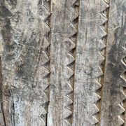 Ancient eroded wooden Tsonga Gate from the late nineteenth century, from the KwaZulu/Natal region