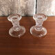 Old pair of vintage round molded glass candle holder
