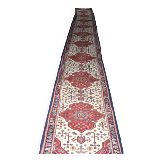 Tapis  oriental en laine, noué main