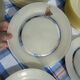New Duralex dish set, 14 pieces with labels.