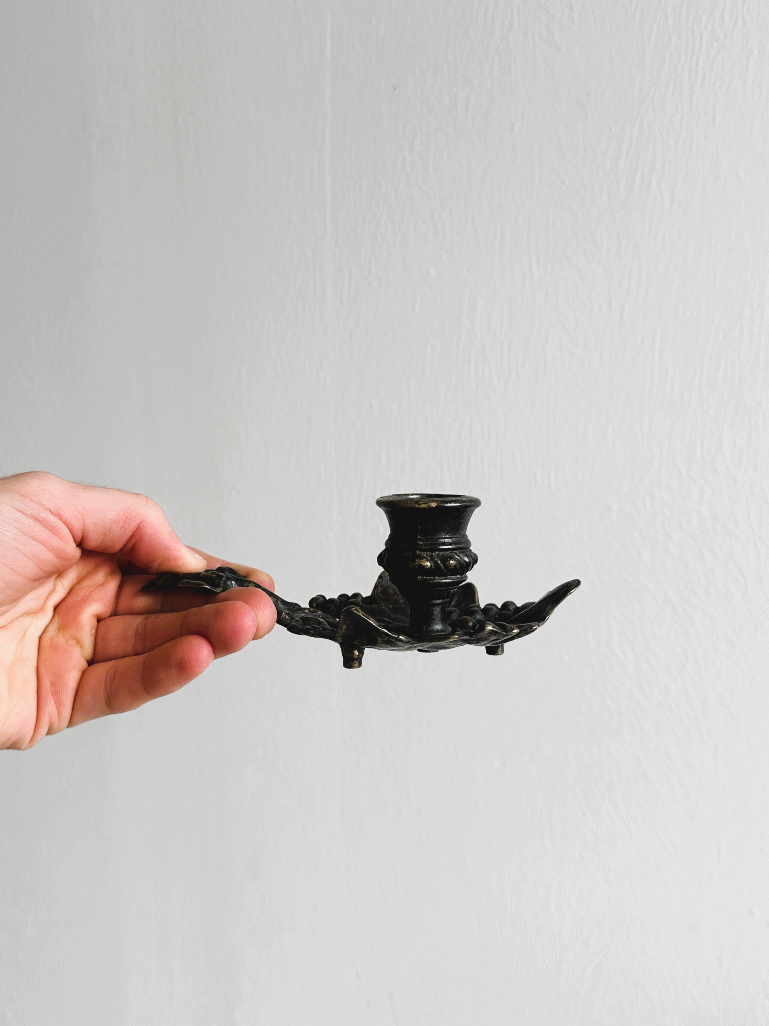 Rat tail metal candle holder