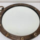 Round mirror with iron frame, vintage