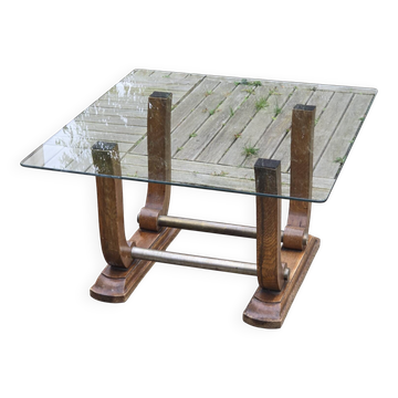 Art Deco coffee table in glass, wood, and brass.