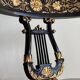 Pair of Empire-style bergère armchairs decorated with swans and lyres