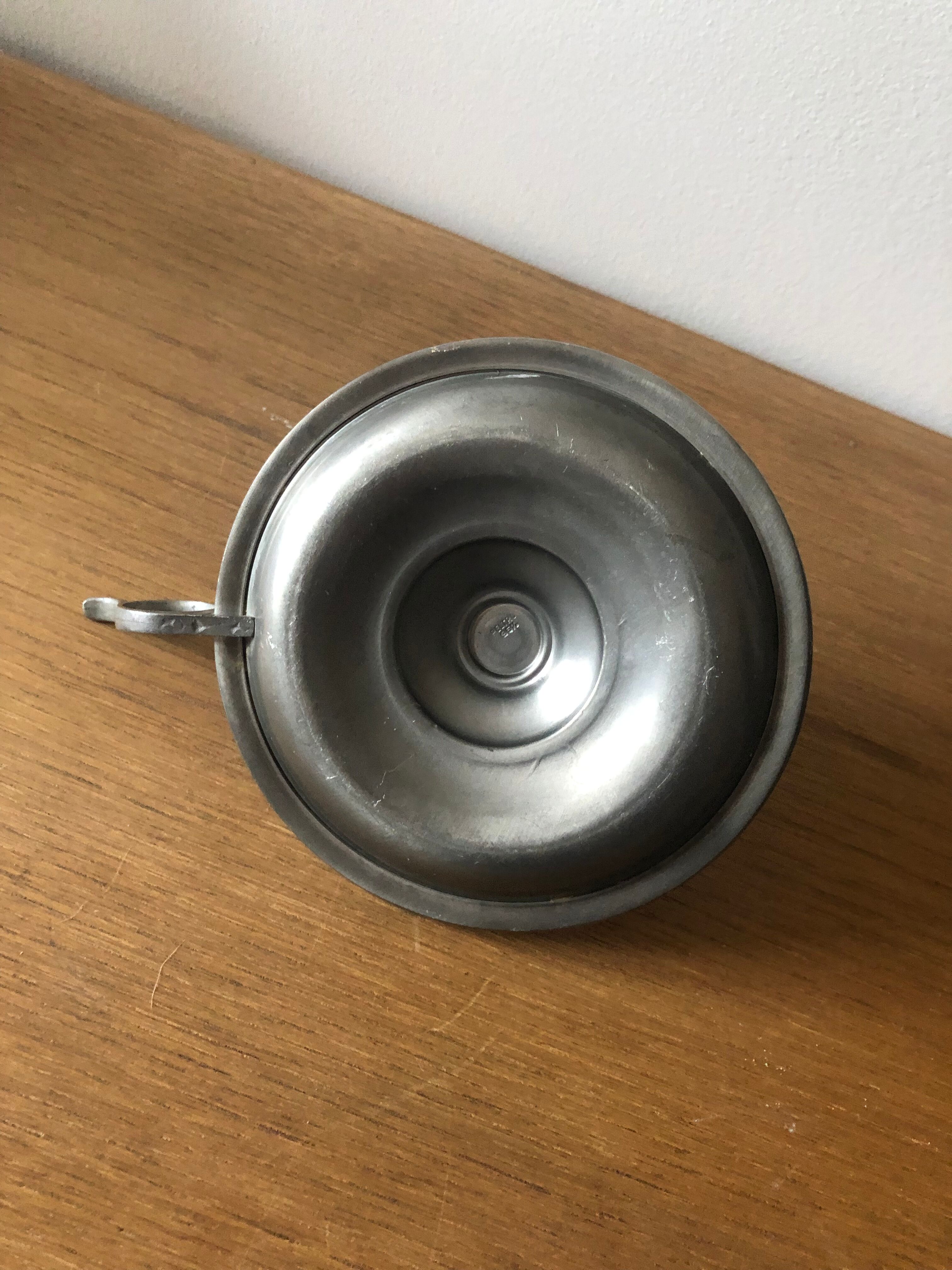 Tin hand candle holder