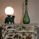 Lampe ours en céramique verte et globe opaline blanc