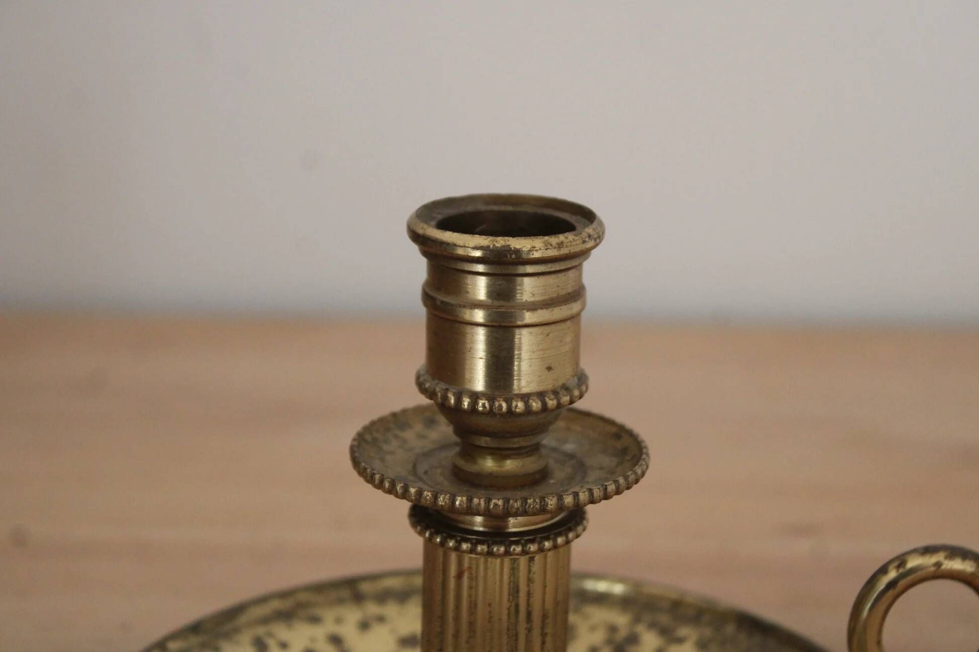 Antique brass hand candlestick – Columned fluted cellar rat