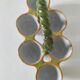 Antique egg holder by Jules Verlingue with polychrome floral decoration.