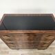 1940s Art Decò chest of drawers in walnut burl with black glass top