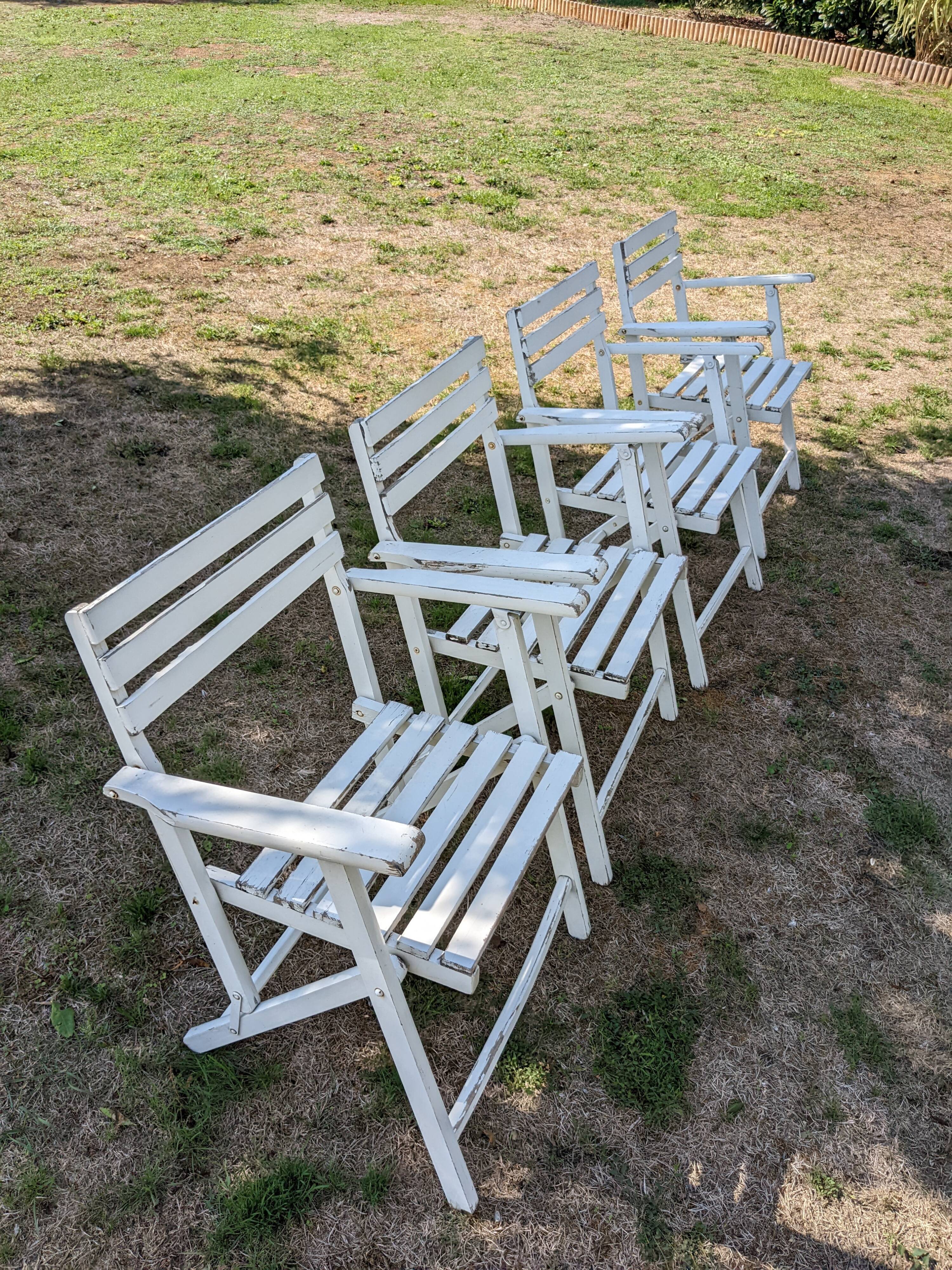 Set of 4 folding wooden garden chairs