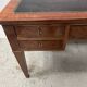 Louis XVI style flat desk in walnut and veneer, 19th century.
