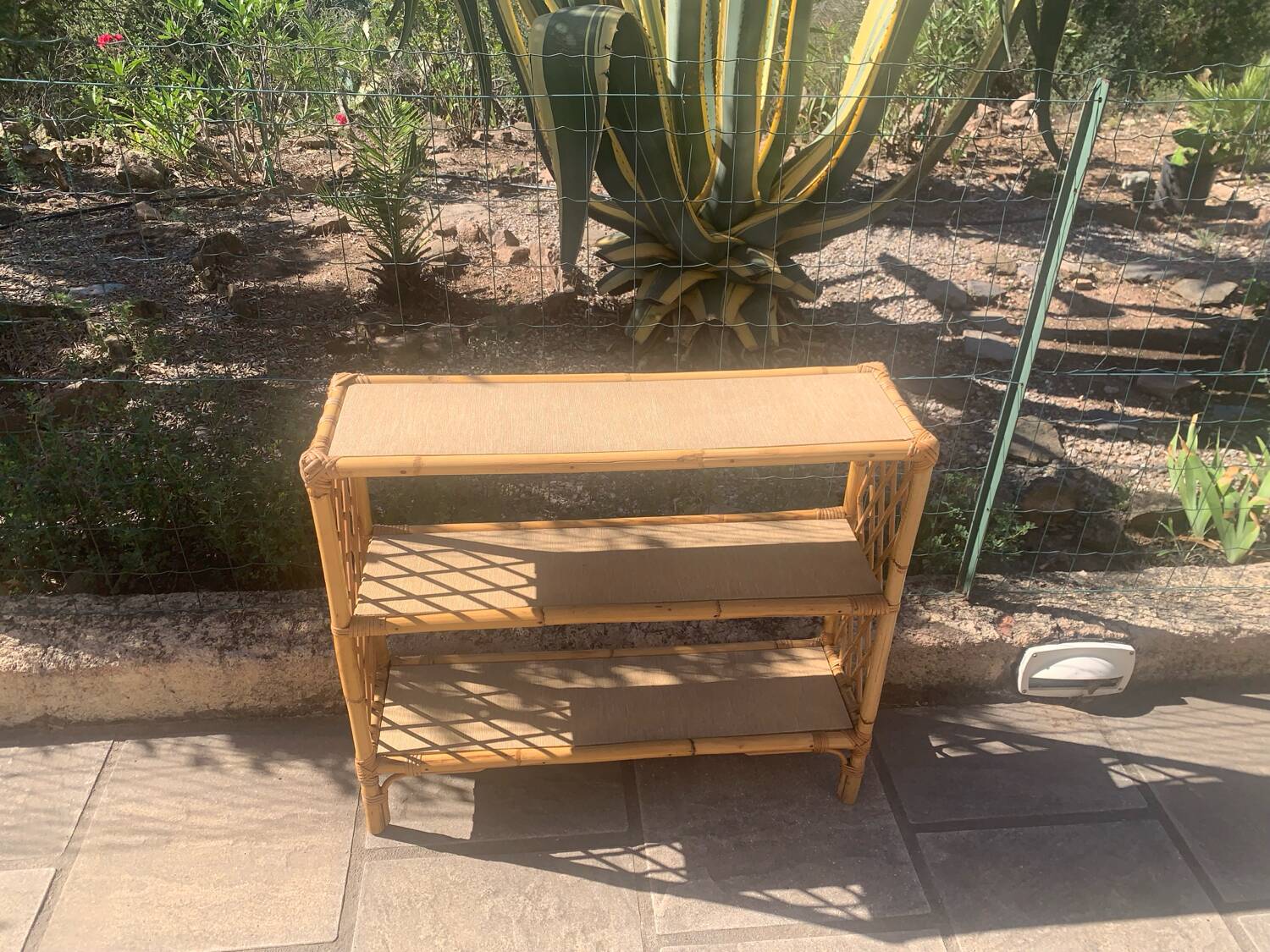Rattan shelf with crossbars 60's