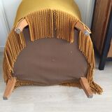 Toad fringed velvet armhair