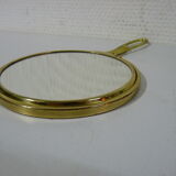 Old mirror double face with golden hand