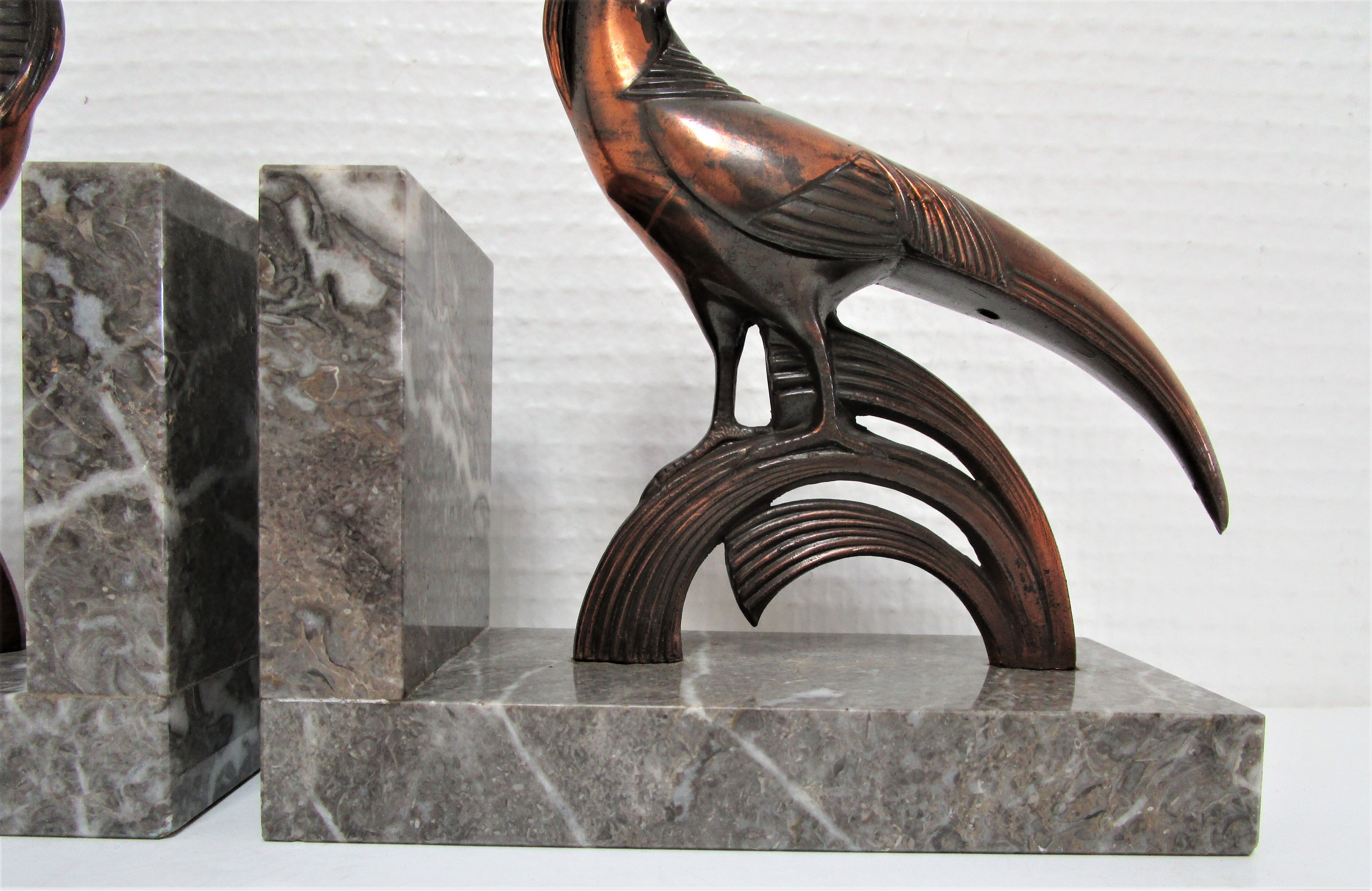Pair of greenhouse books bird Art Deco metal patinated marble