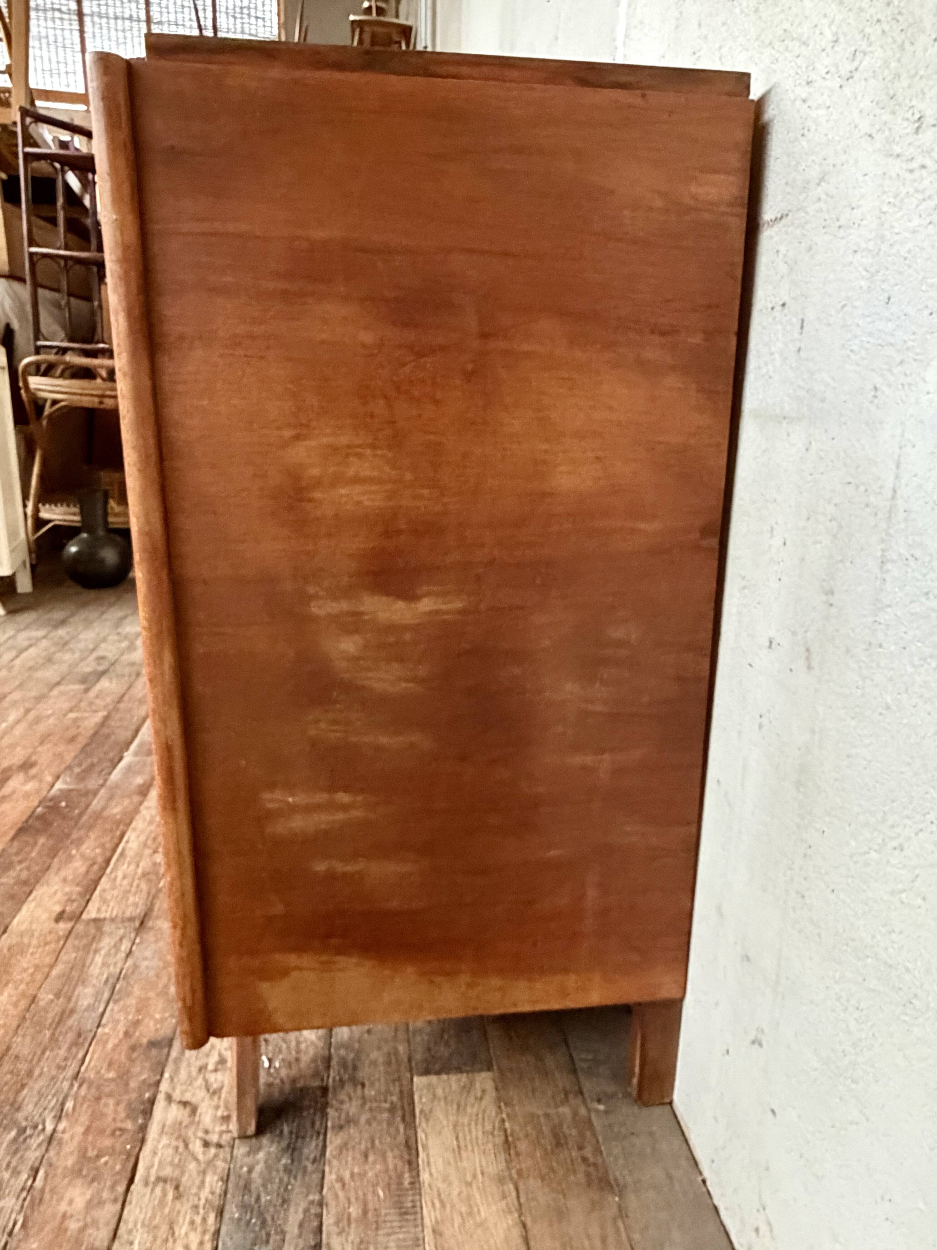 Art Deco vintage commode with tapered legs.