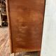 Art Deco vintage commode with tapered legs.
