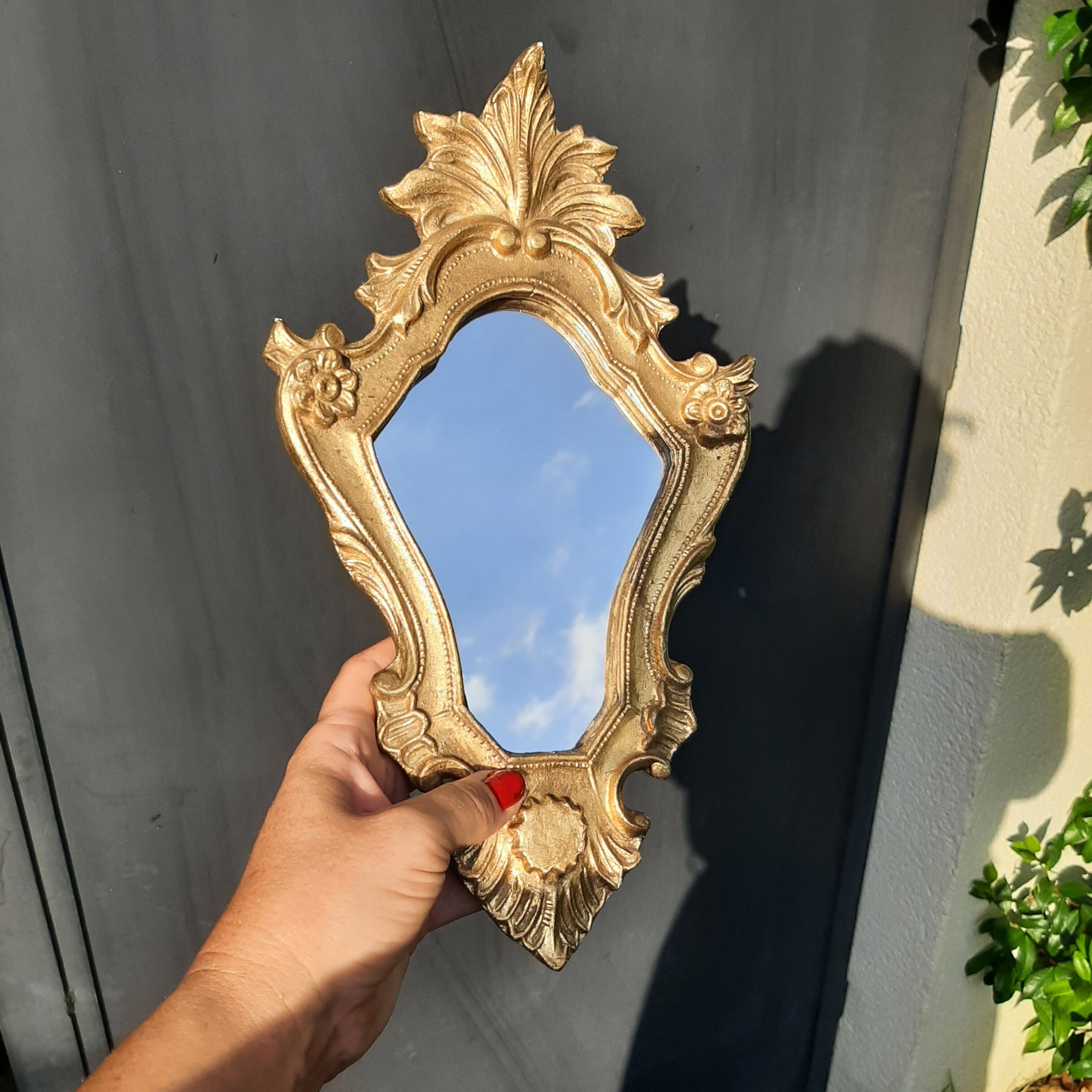 Miroir baroque bois doré et 2 angelots