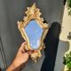 Miroir baroque bois doré et 2 angelots