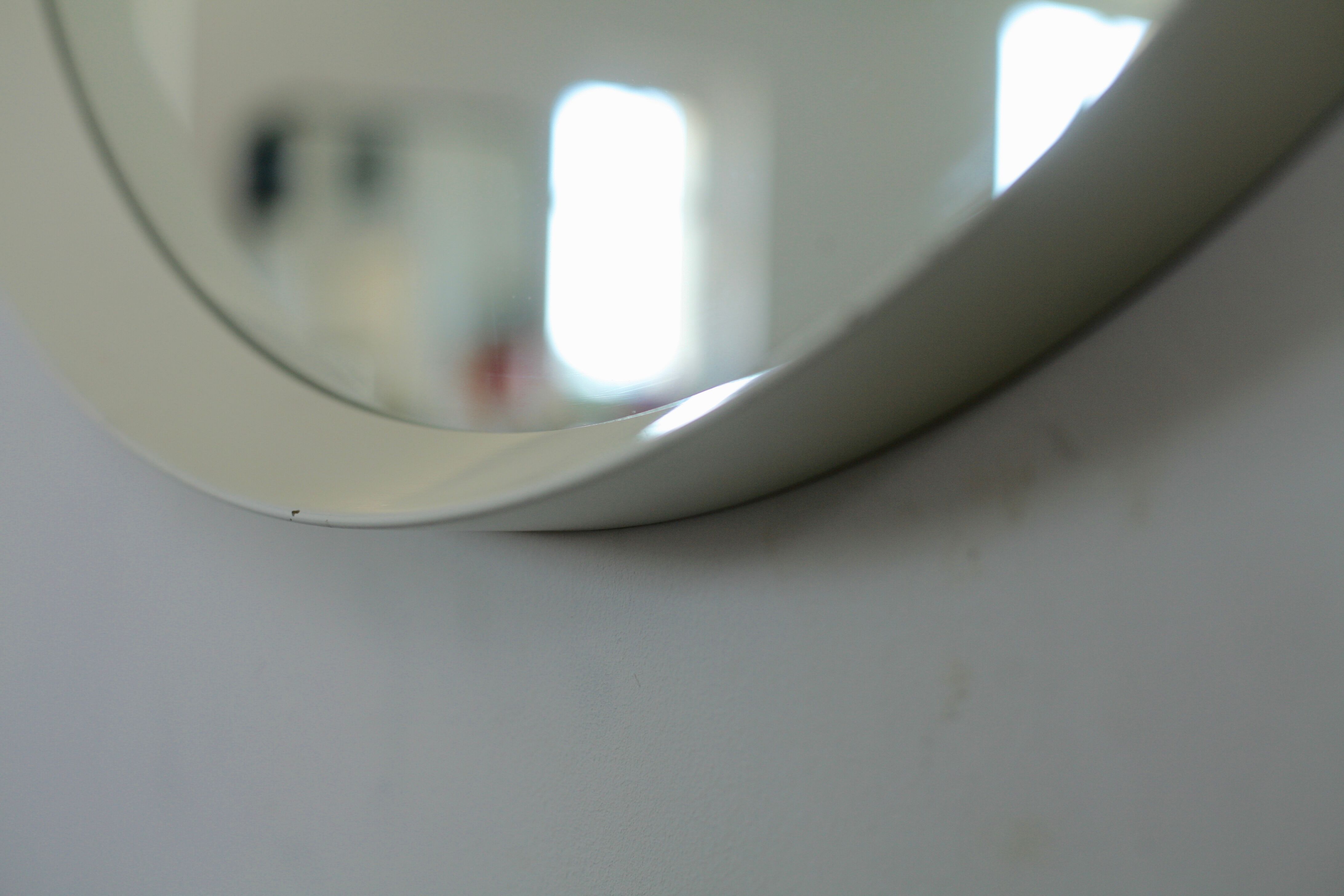 Circular mirror in "cream" laqué wood France circa 1960 68cm