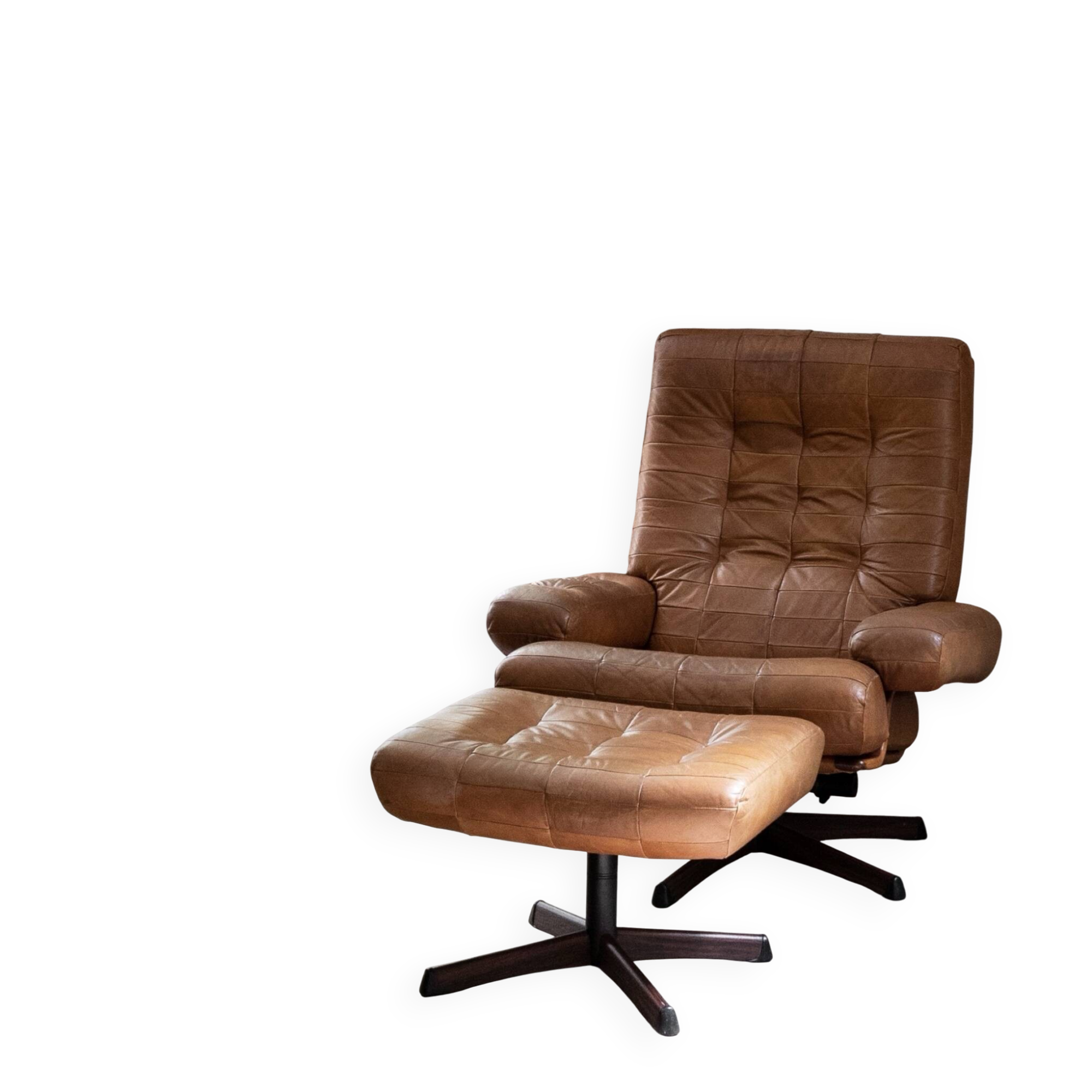 Armchair and footrest in leather