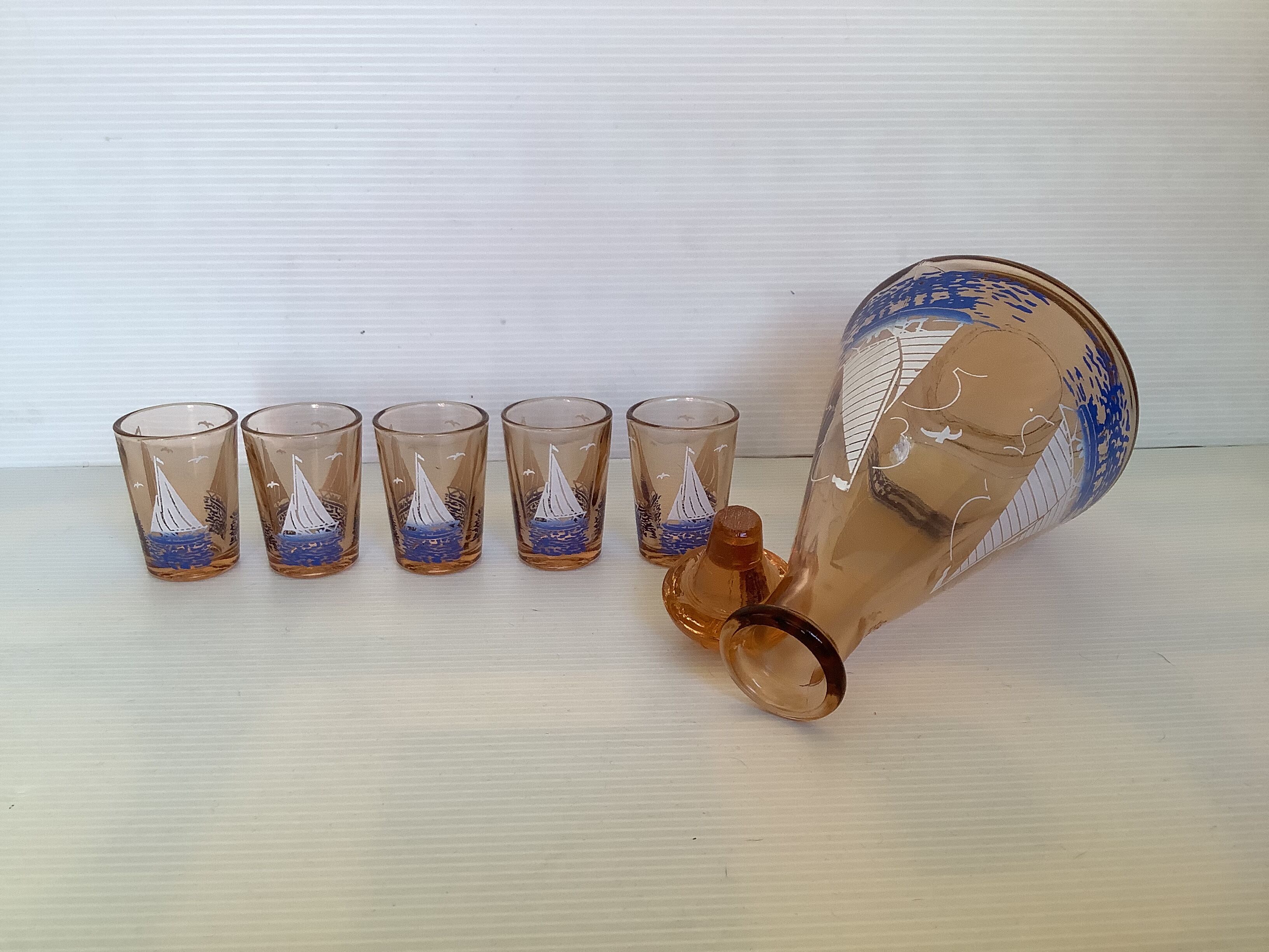 Old sailing decanter and 5 small matching liquor glasses