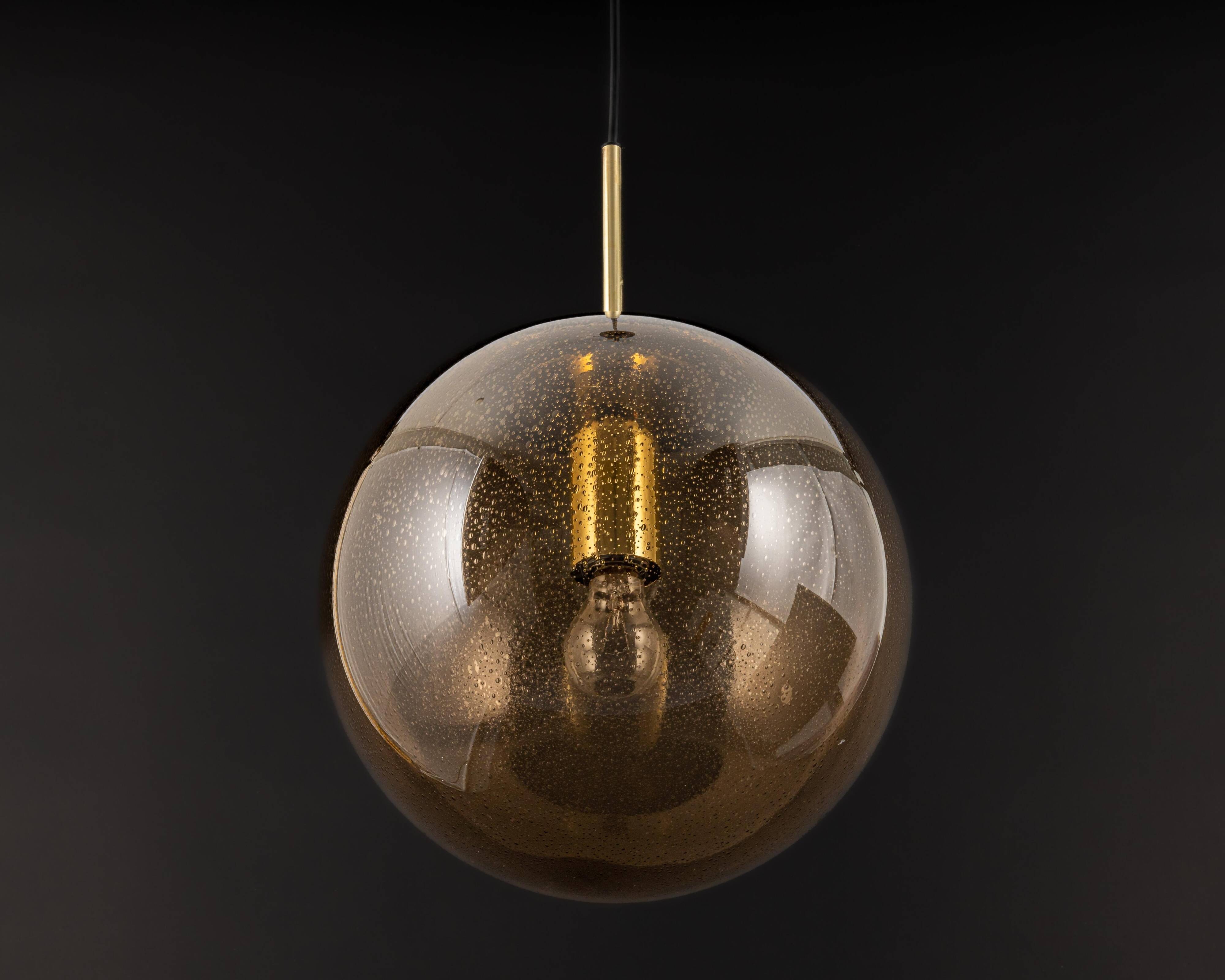 Large smoked glass ball pendant by Limburg with brass, Germany, 1970s.