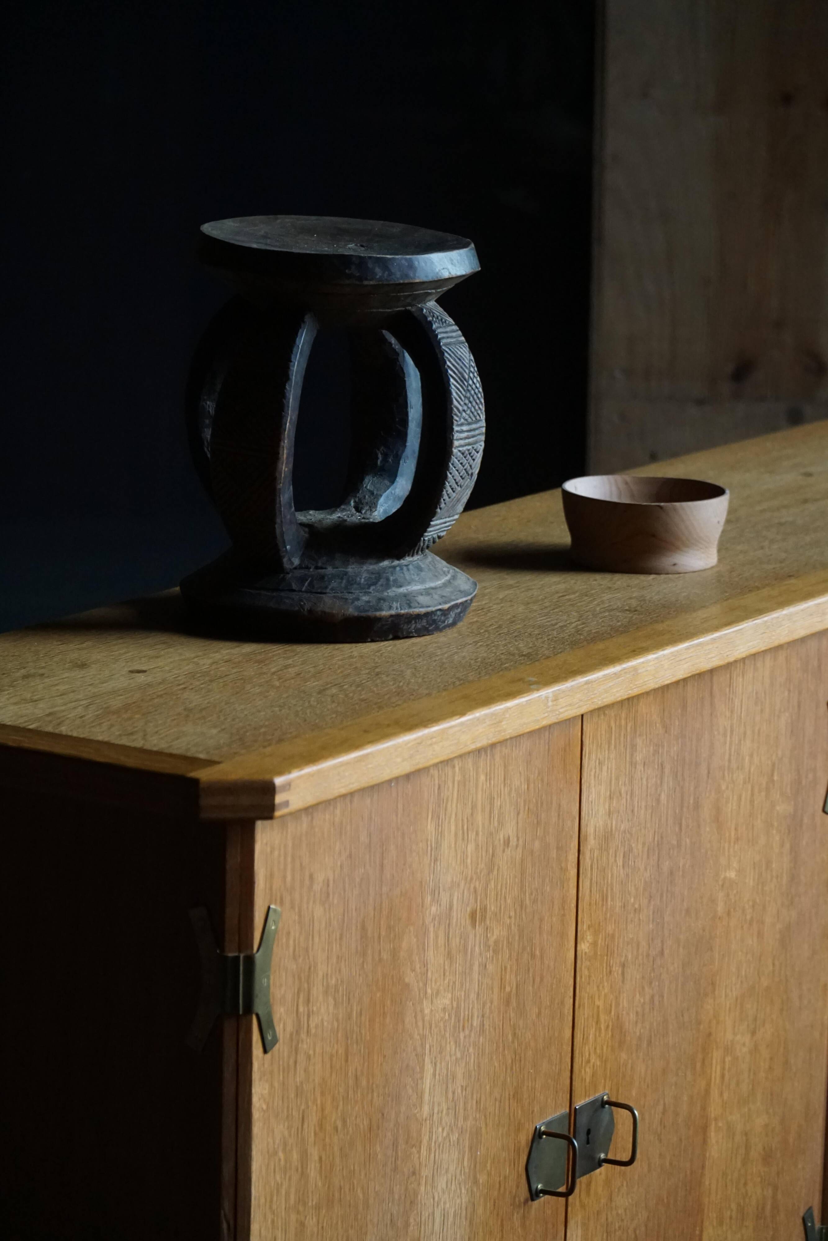 Oak and brass buffet by Henning Kjærnulf, Mid-century modern Danish, 1960s.