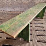 Old wooden bench side table grass green