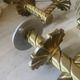 Pair of neoclassical wall sconces in twisted brass and ribbed glass.